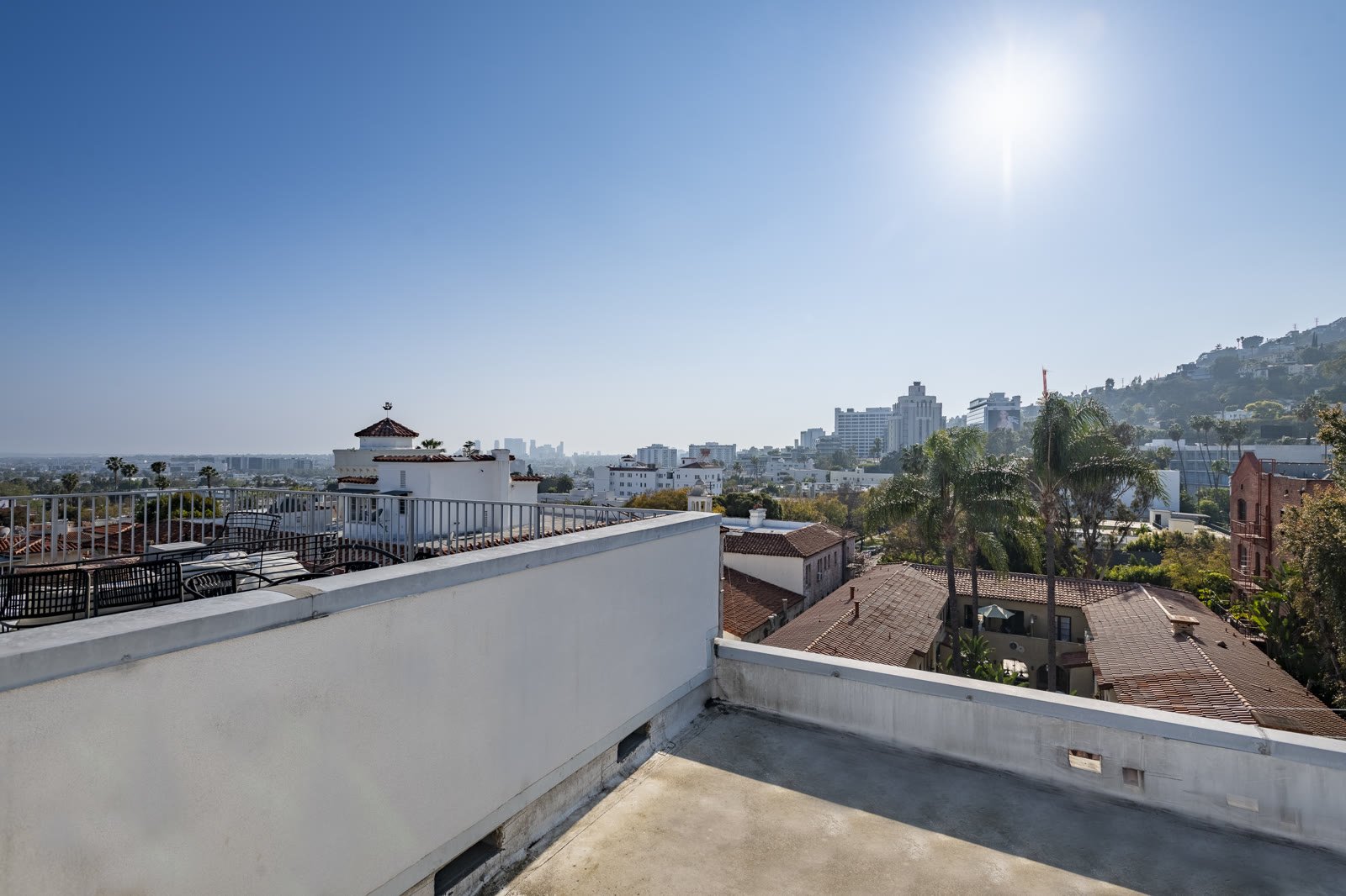 Open rooftop terrace with panoramic city views